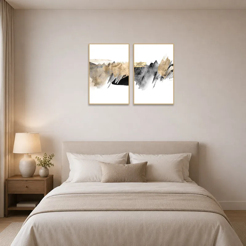 Black and white abstract art set above a bed, giving the bedroom a sophisticated look.