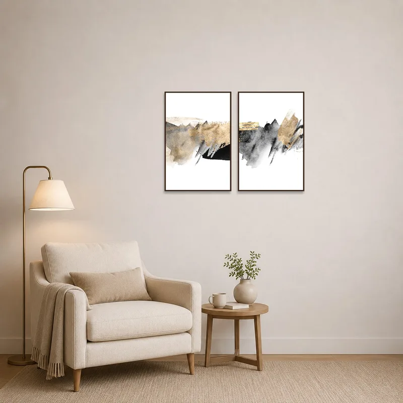 Golden abstract art set enhancing a cozy reading corner with a comfortable chair.
