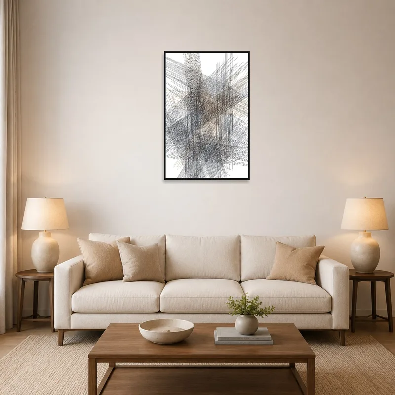 Intricate line geometry art on living room wall above a modern sofa.