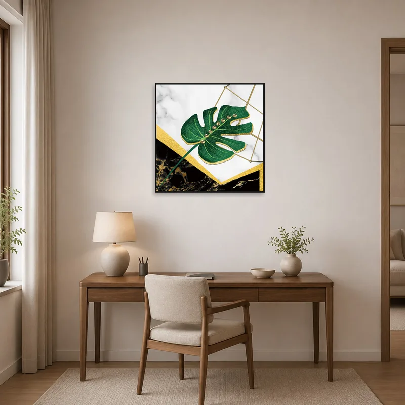 Home office showcasing the Luxe Monstera Leaf art print on a wall near the desk.