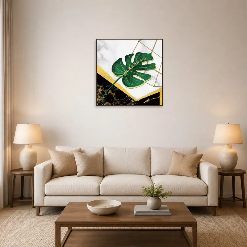 Luxe Monstera Leaf art print on a wall in the living room with modern furniture.