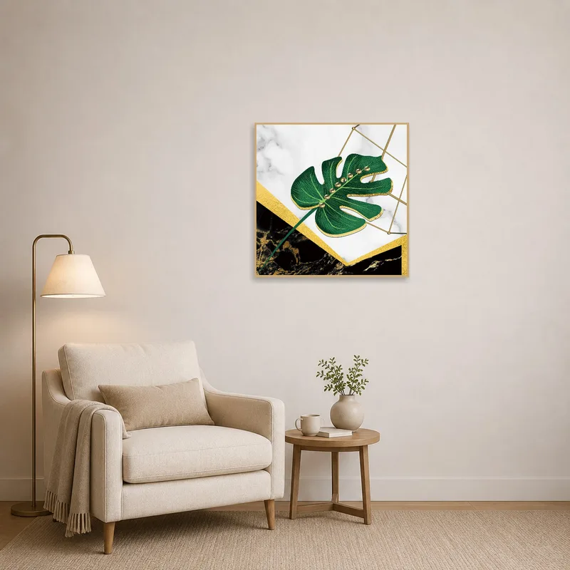 Reading corner adorned with the Luxe Monstera Leaf print alongside comfy seating.