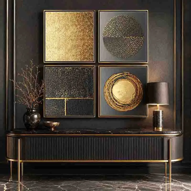 Minimalist room featuring textured gold and black art on a plain white wall.