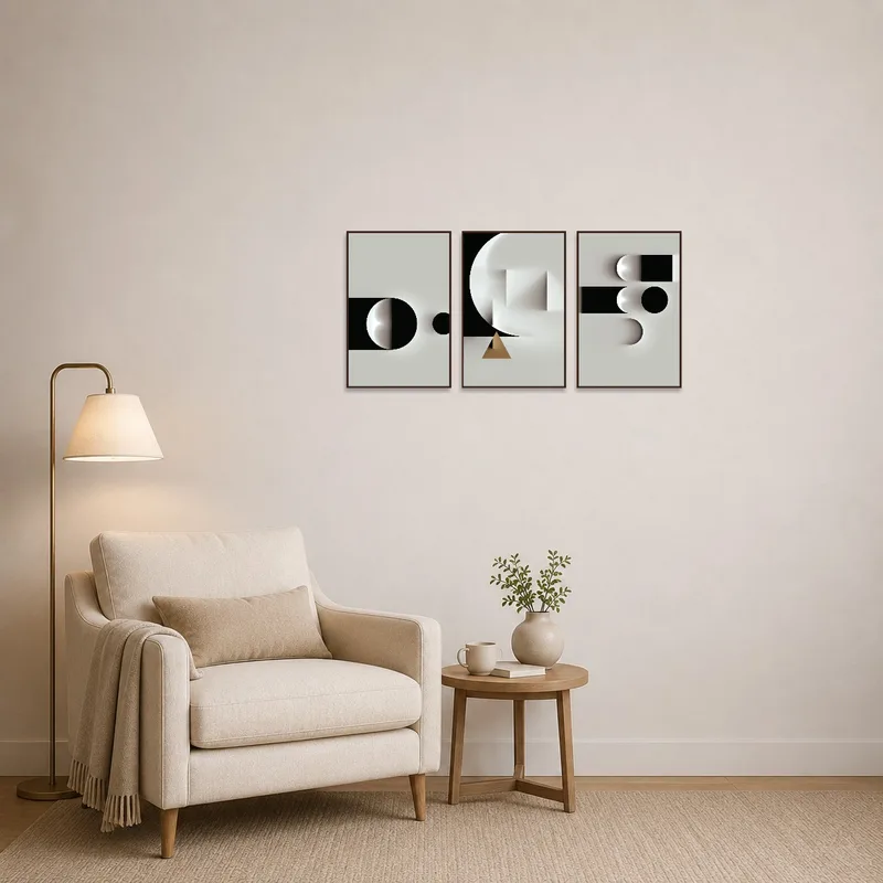 Geometric triptych art enhances a cozy reading corner.
