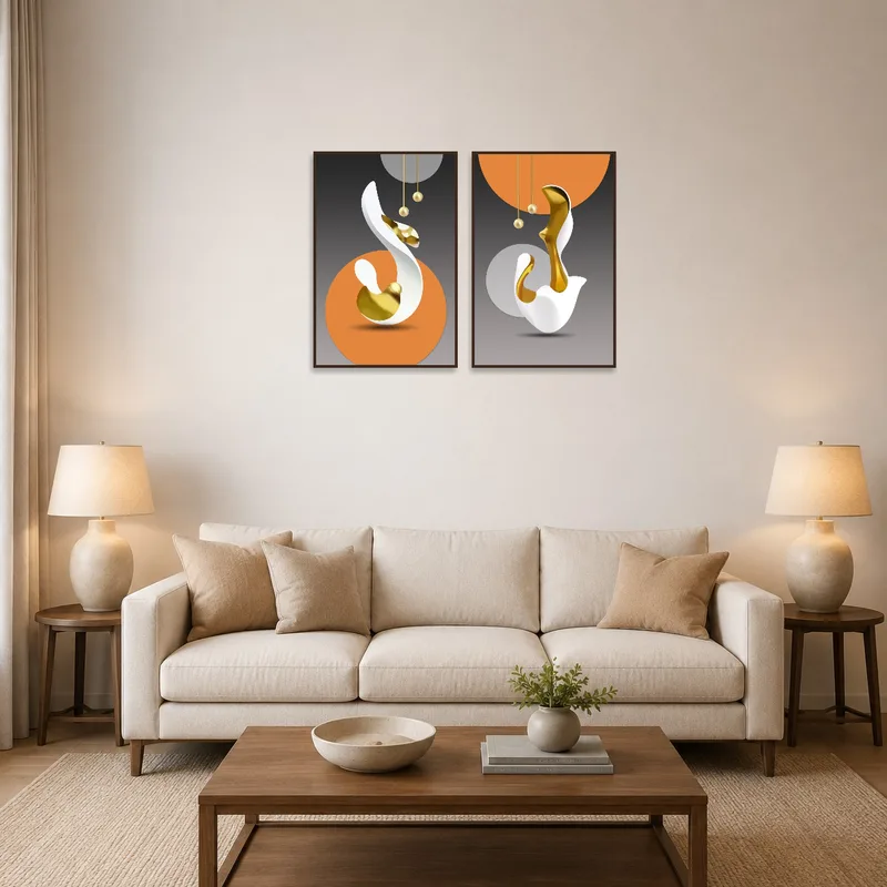 The modern abstract print set with gold accents adds a dynamic touch to the living room above a sleek sofa.