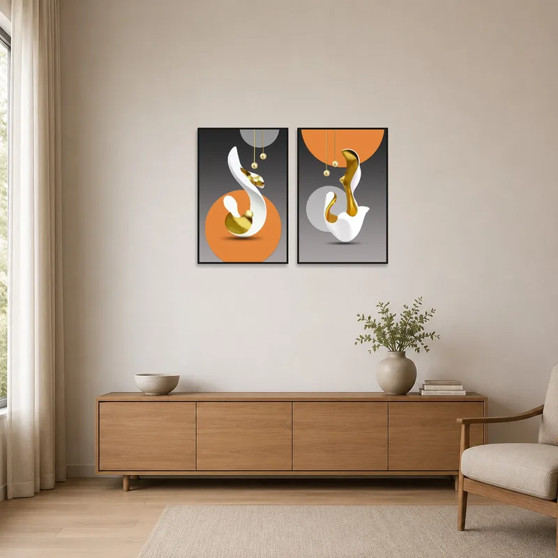 Gold-accented abstract prints emphasize the minimalist style, complementing the room's clean lines and sparse decor.