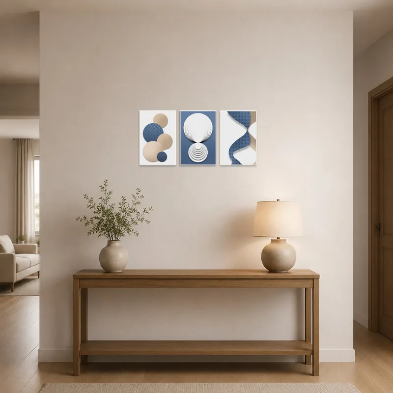 Geometric abstraction triptych welcoming guests in a stylish entrance hall.