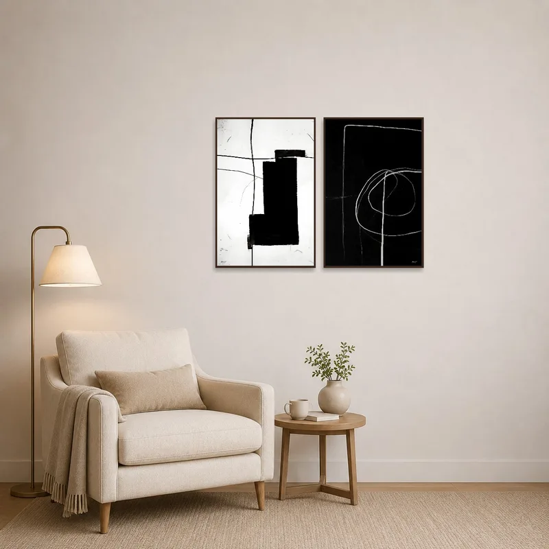 Monochrome art pieces adding sophistication to a reading corner.