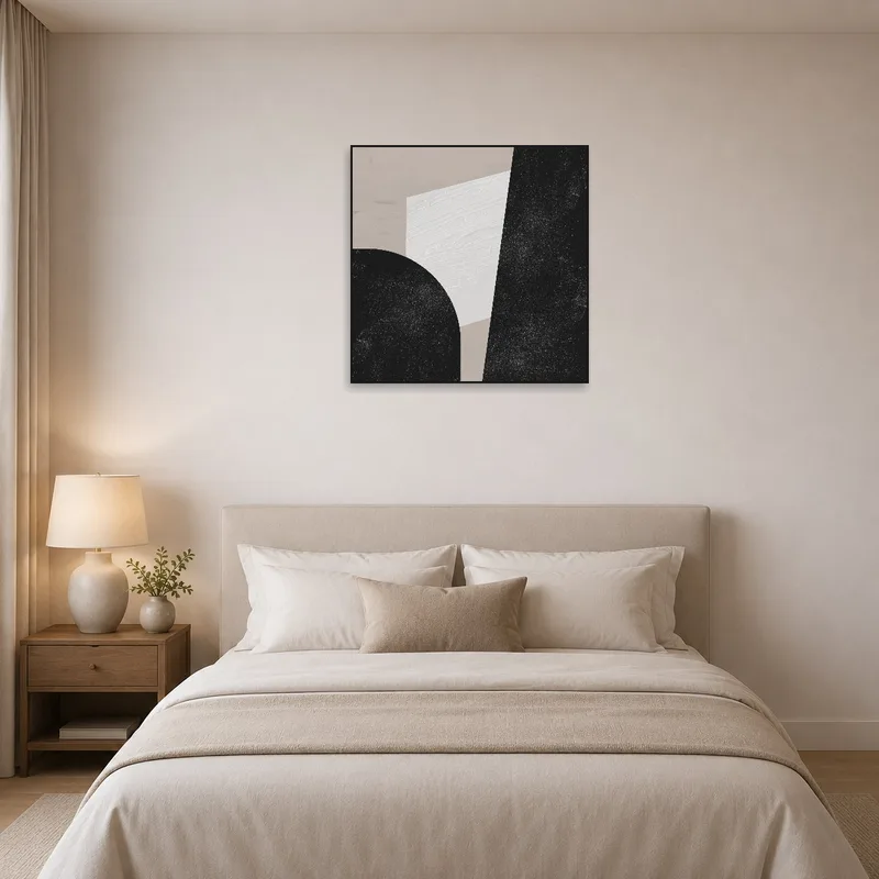 A calm bedroom ambiance is enhanced by a monochrome geometric abstract art print above the bed.