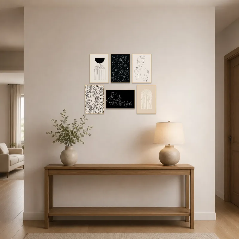 Geometric and line art compositions enhance the entrance hall with a contemporary feel.