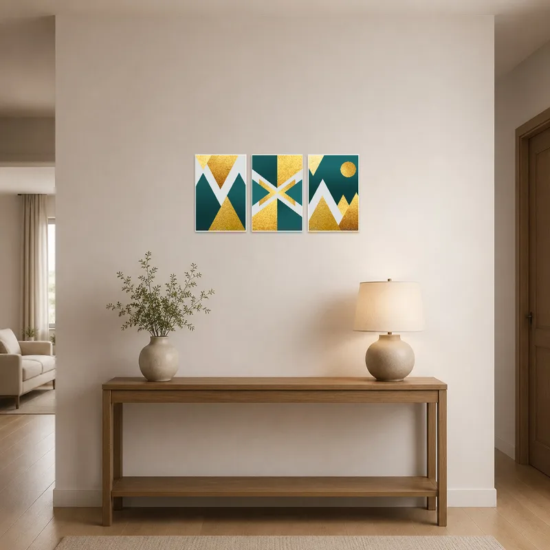 Stylish entrance hall adorned with a sophisticated geometric triptych in rich gold and teal hues.
