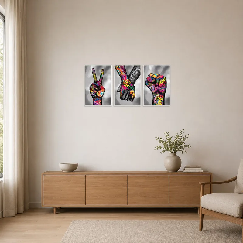 Bold hand gesture triptych on a clean minimalist wall with simple furniture.