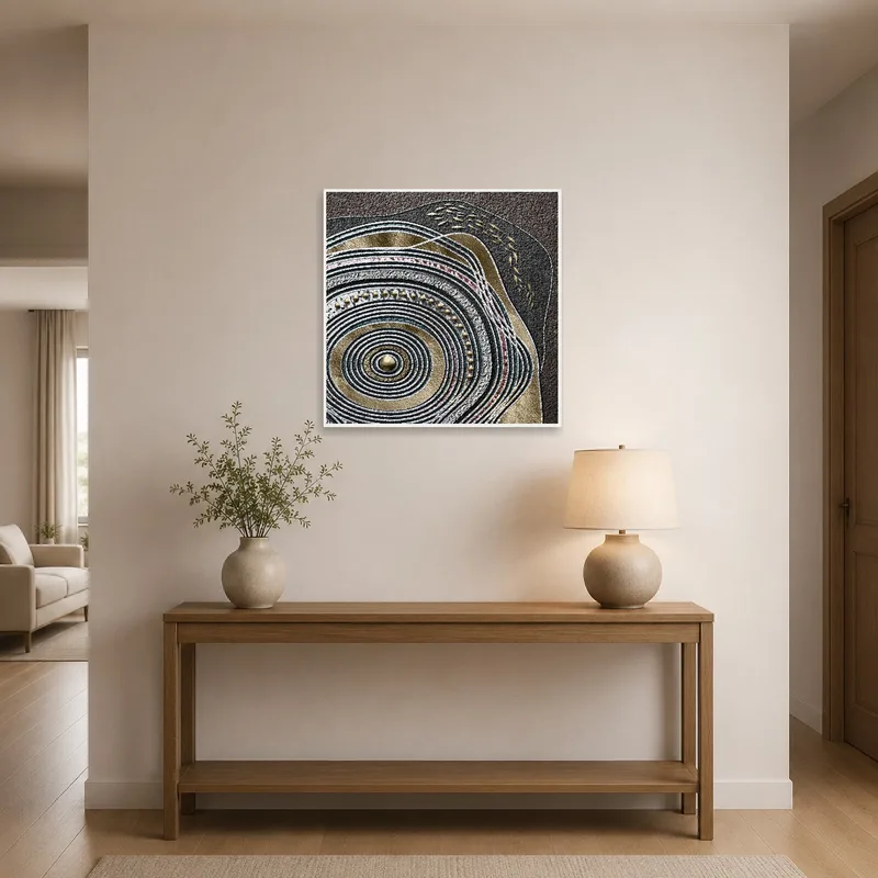 Bold abstract piece with metallic details enhancing an entrance hall.