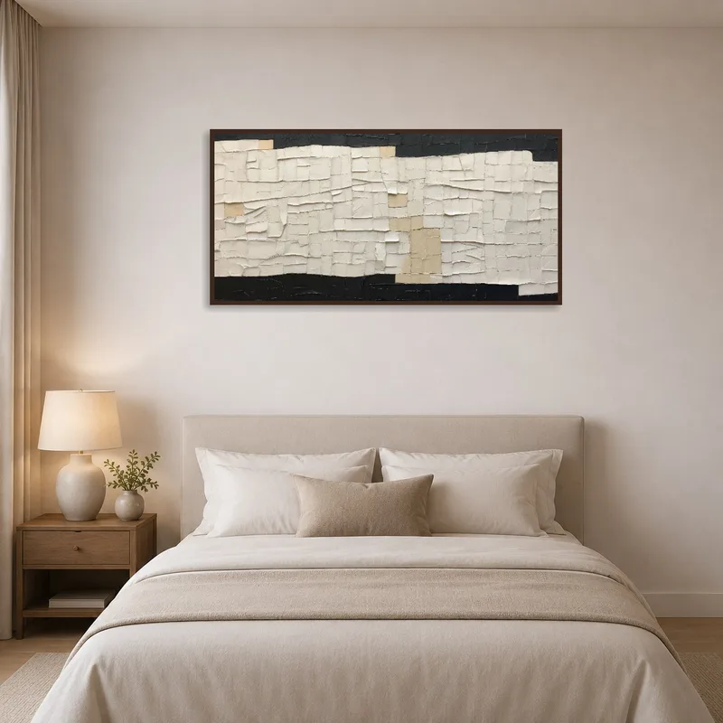 Textured abstract tapestry in neutral tones bringing tranquility to a bedroom.