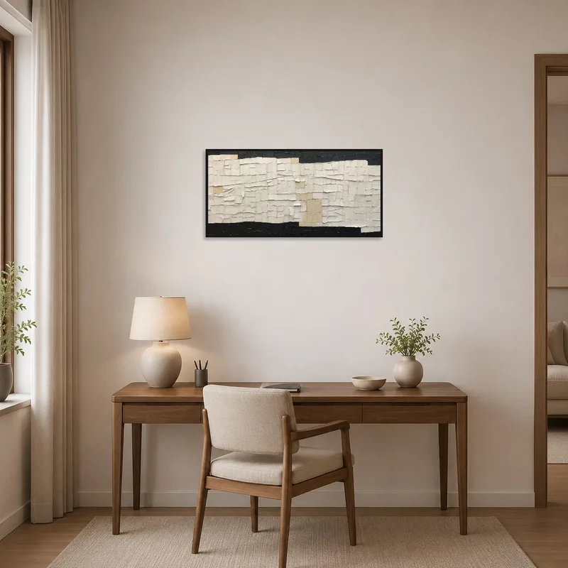 Textured abstract tapestry in neutral tones inspiring creativity in a home office.