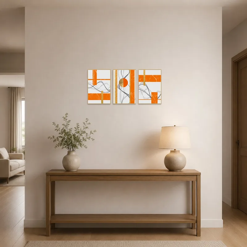 Striking orange and gold artwork greets in the entrance hall.