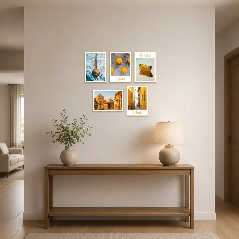 Entrance hall enhanced by a vibrant coastal and architectural photography set.